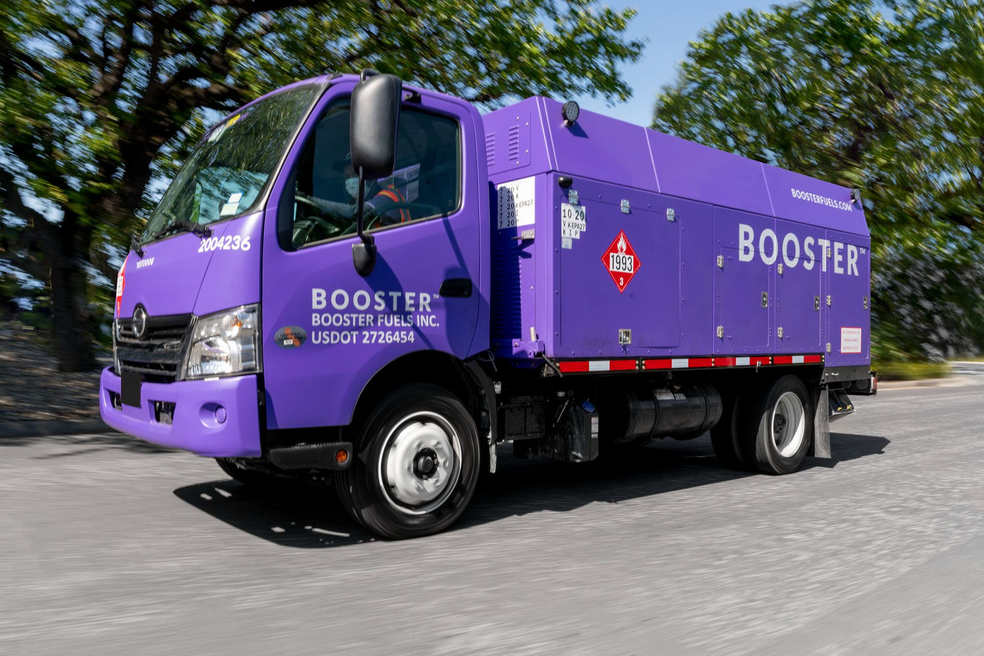 A Booster Fuels Smart Tanker on the road